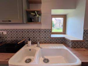 Phòng tắm tại Cottage avec Piscine et Jacuzzi - Normandie