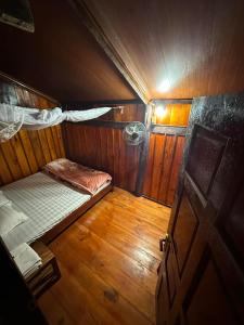 Postel nebo postele na pokoji v ubytování Thai's homestay hương Phia Thắp