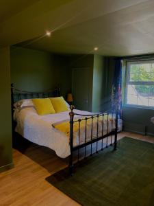 Ένα ή περισσότερα κρεβάτια σε δωμάτιο στο Crowtree Lodge