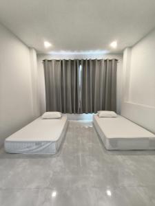 Ένα ή περισσότερα κρεβάτια σε δωμάτιο στο Mind house