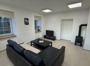 Χώρος καθιστικού στο Apartmány Papírna