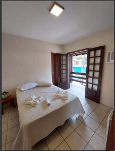 Кровать или кровати в номере Pousada Terranova Frente ao Mar