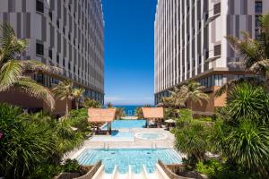 Bazén v ubytování Apec Mandala Beach Mui Ne Resort nebo v jeho okolí