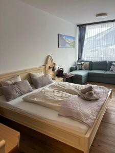 Ένα ή περισσότερα κρεβάτια σε δωμάτιο στο Steinbock Apartement