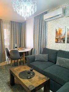 Posezení v ubytování Snowflake in Royal Park, Shuttle, SPA