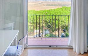 an open door to a balcony with a view at 2 Bedroom Awesome Apartment In Facinas - Tarifa in Facinas