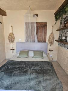 Ένα ή περισσότερα κρεβάτια σε δωμάτιο στο Tramontana Camera Vista