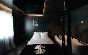 Ένα ή περισσότερα κρεβάτια σε δωμάτιο στο Amour Studio - Jacuzzi