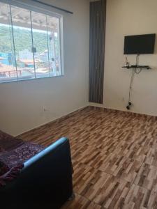 Et tv og/eller underholdning på Casa Porto das Conchas