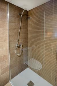 Ένα μπάνιο στο Habitaciones Algodón con baño propio