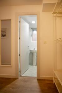 Ένα μπάνιο στο Habitaciones Algodón con baño propio