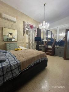 Giường trong phòng chung tại Master Suite with Kingsize Bed and Ensuite