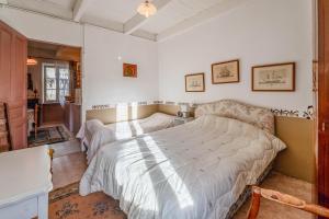 Ένα ή περισσότερα κρεβάτια σε δωμάτιο στο Appart agréable la Salvetat Agout