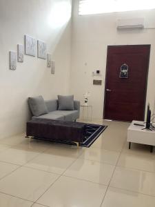 Posezení v ubytování D' Ara SZ Homestay