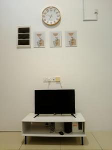 TV a/nebo společenská místnost v ubytování D' Ara SZ Homestay