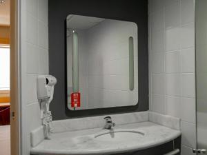 Koupelna v ubytování ibis Macae + 32 fotografií