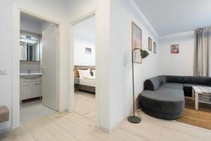 Ένα ή περισσότερα κρεβάτια σε δωμάτιο στο Pipera Garden Loft 2BR