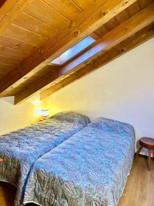 En eller flere senge i et værelse på Ca Novella Apartment