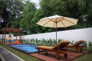 Bazén v ubytování Amitha Lodge Uluwatu nebo v jeho okolí + 11 fotografií