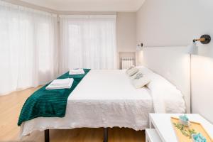 Ένα ή περισσότερα κρεβάτια σε δωμάτιο στο Apartamento CRISTINA en el CENTRO +9 φωτογραφίες