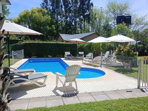 Bazén v ubytování Cabañas Midelem nebo v jeho okolí