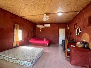 Ένα ή περισσότερα κρεβάτια σε δωμάτιο στο Kaewma farmstay