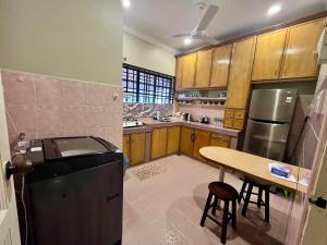 Kuchyň nebo kuchyňský kout v ubytování Townhouse by YaShe