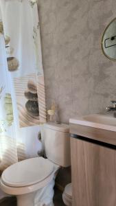 Ένα μπάνιο στο Cabaña Vista Playa Curiñanco