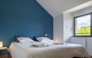 Postel nebo postele na pokoji v ubytování Gite des amandines