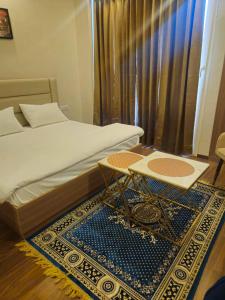 Postel nebo postele na pokoji v ubytování Orbit Stays