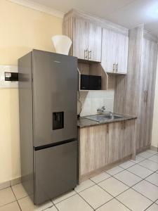 Køkken eller tekøkken på Your easy stay OR Tambo