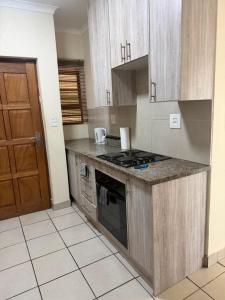 Køkken eller tekøkken på Your easy stay OR Tambo + 6 billeder