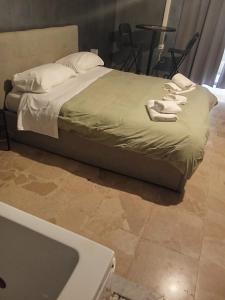 Ένα ή περισσότερα κρεβάτια σε δωμάτιο στο Penelope 2