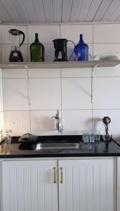 O bucătărie sau chicinetă la Casa da Angela Quarto Duplo