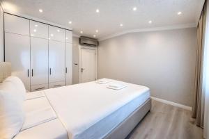 Ένα ή περισσότερα κρεβάτια σε δωμάτιο στο Casa Florya Suites