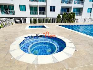 Bazén v ubytování Acogedores apartamentos en el Rodadero RS By Bedviajes nebo v jeho okolí