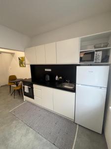 Nhà bếp/bếp nhỏ tại Apartmány Atrium +26 ảnh