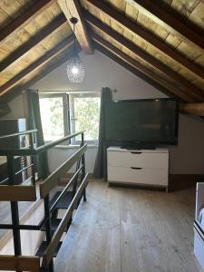 TV a/nebo společenská místnost v ubytování Holiday home in Alvados