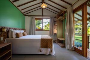 Postel nebo postele na pokoji v ubytování Canto do Sol Praia