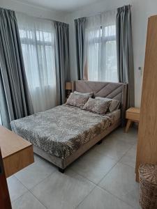 Postel nebo postele na pokoji v ubytování 2 bedroom-Pearl Side 101