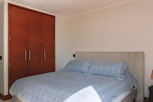 Postel nebo postele na pokoji v ubytování En Parque Pinares, descanso en el Lago + 32 fotografií