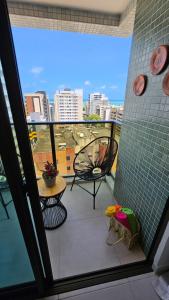 Un balcón o terraza en Promenade III 1207, Luxo no Coração da Ponta Verde