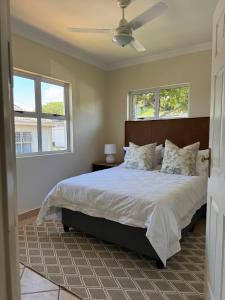 Ένα ή περισσότερα κρεβάτια σε δωμάτιο στο Belair Signature No7 Ballito BHE +78 φωτογραφίες