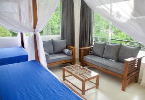 Χώρος καθιστικού στο Mirissa Moments Hotel