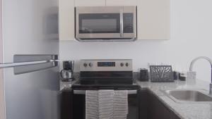 Kuchyň nebo kuchyňský kout v ubytování Bambú Luxury Stay-10 min from Airport