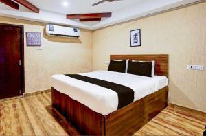 Ένα ή περισσότερα κρεβάτια σε δωμάτιο στο Classic glory inn +5 φωτογραφίες