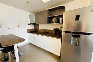 Køkken eller tekøkken på Hermoso Loft Velas al mar