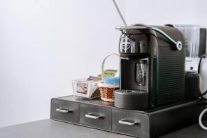 Příslušenství pro přípravu čaje a kávy v ubytování La Faustina Aosta + 59 fotografií