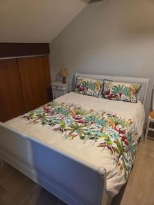 Ένα ή περισσότερα κρεβάτια σε δωμάτιο στο Au Grés du Vent