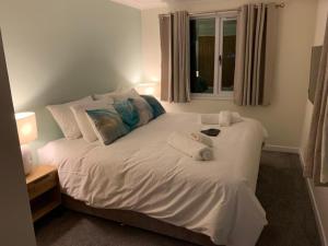 Ένα ή περισσότερα κρεβάτια σε δωμάτιο στο Salen Pier Haven